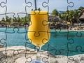 Spēle Finierzāģis puzzle pludmalē  online